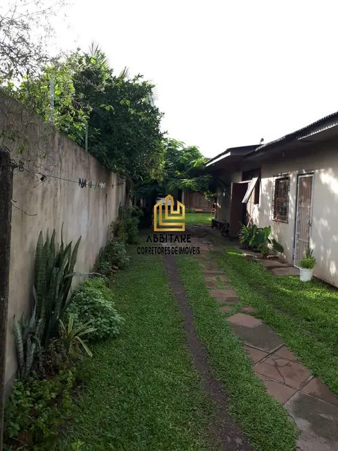 Casa com 4 quartos à venda, 101m2 em Torres - RS - imagem 2 Foto 2 de Casa com 4 quartos à venda, 101m2 em Torres - RS