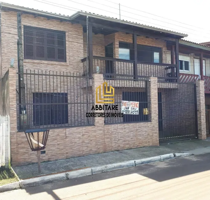 Foto 1 de Casa com 2 quartos à venda, 53m2 em Torres - RS