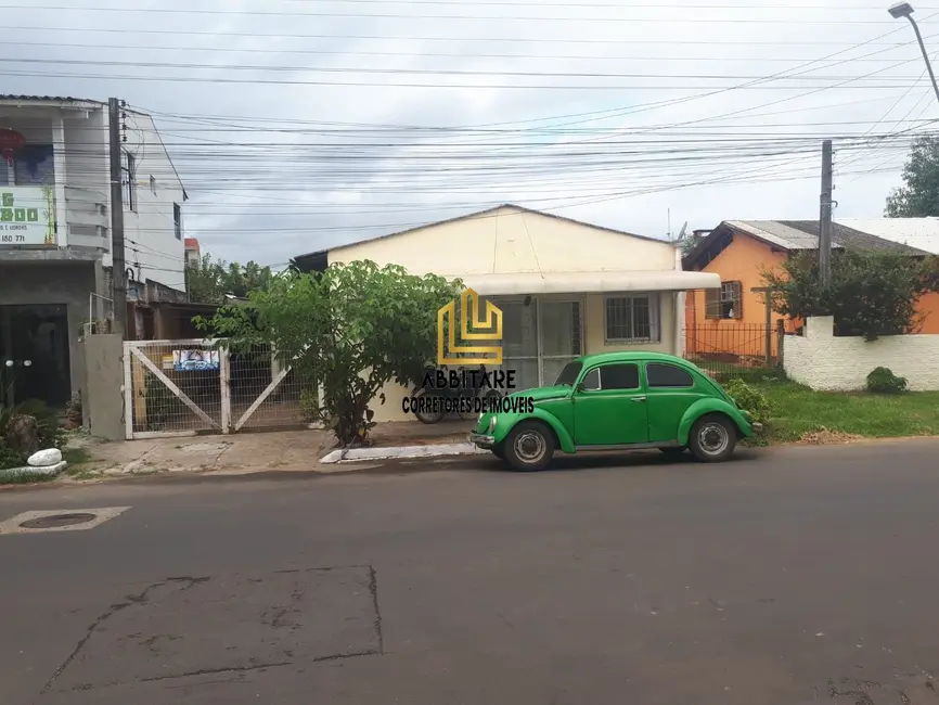 Foto 1 de Casa com 5 quartos à venda, 124m2 em Centro, Torres - RS