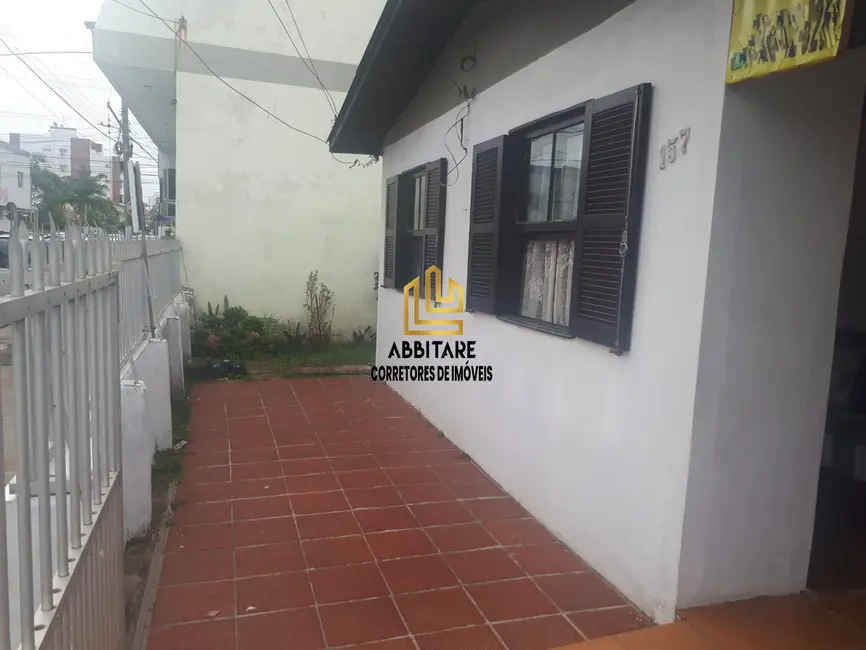 Casa com 3 quartos à venda, 189m2 em Torres - RS - imagem 2 Foto 2 de Casa com 3 quartos à venda, 189m2 em Torres - RS