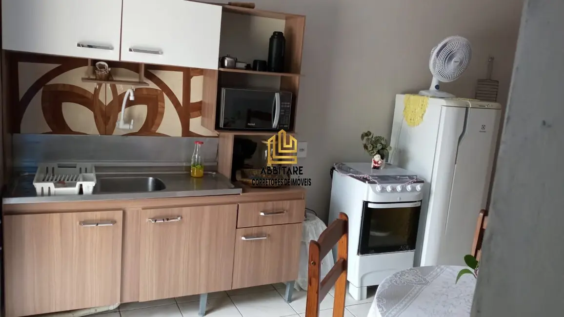 Foto 2 de Casa com 2 quartos à venda, 174m2 em Torres - RS