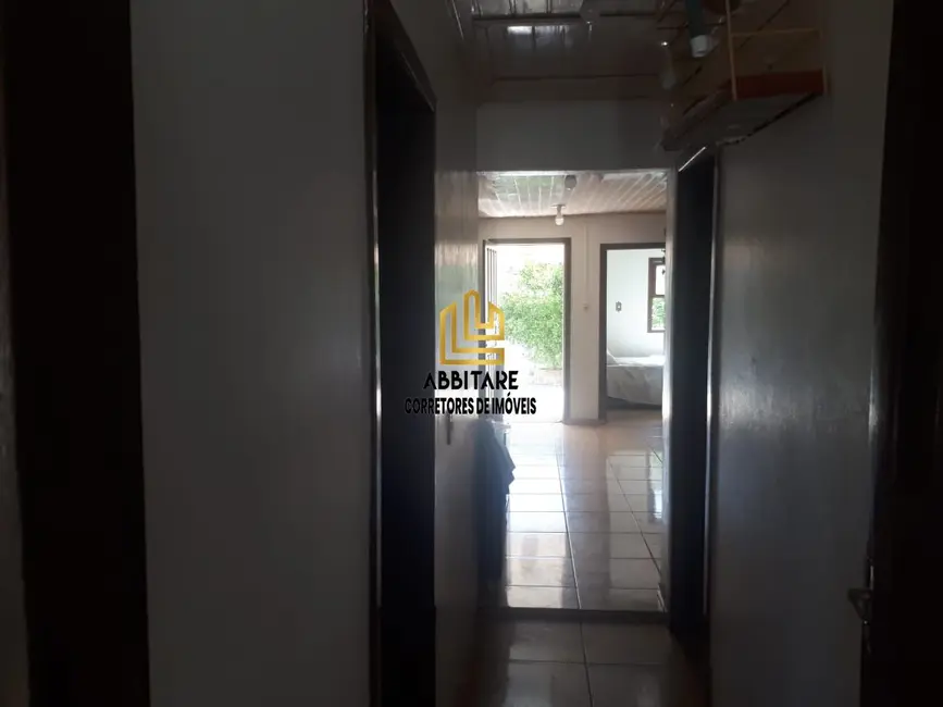 Casa com 4 quartos à venda, 155m2 em Torres - RS - imagem 4 Foto 4 de Casa com 4 quartos à venda, 155m2 em Torres - RS