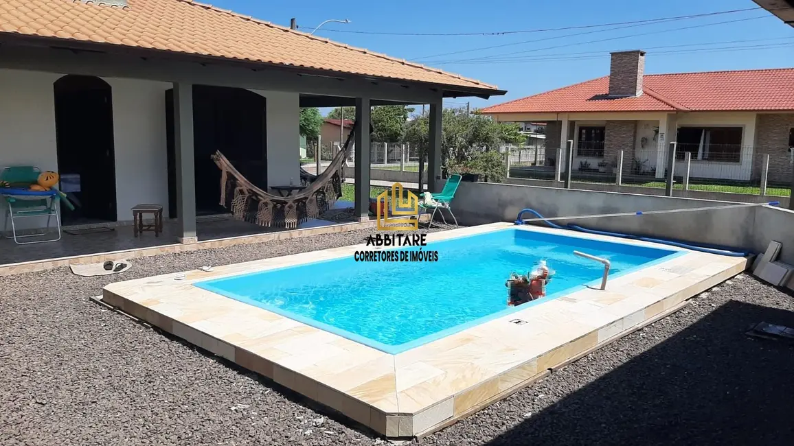 Foto 1 de Casa com 2 quartos à venda, 160m2 em Torres - RS