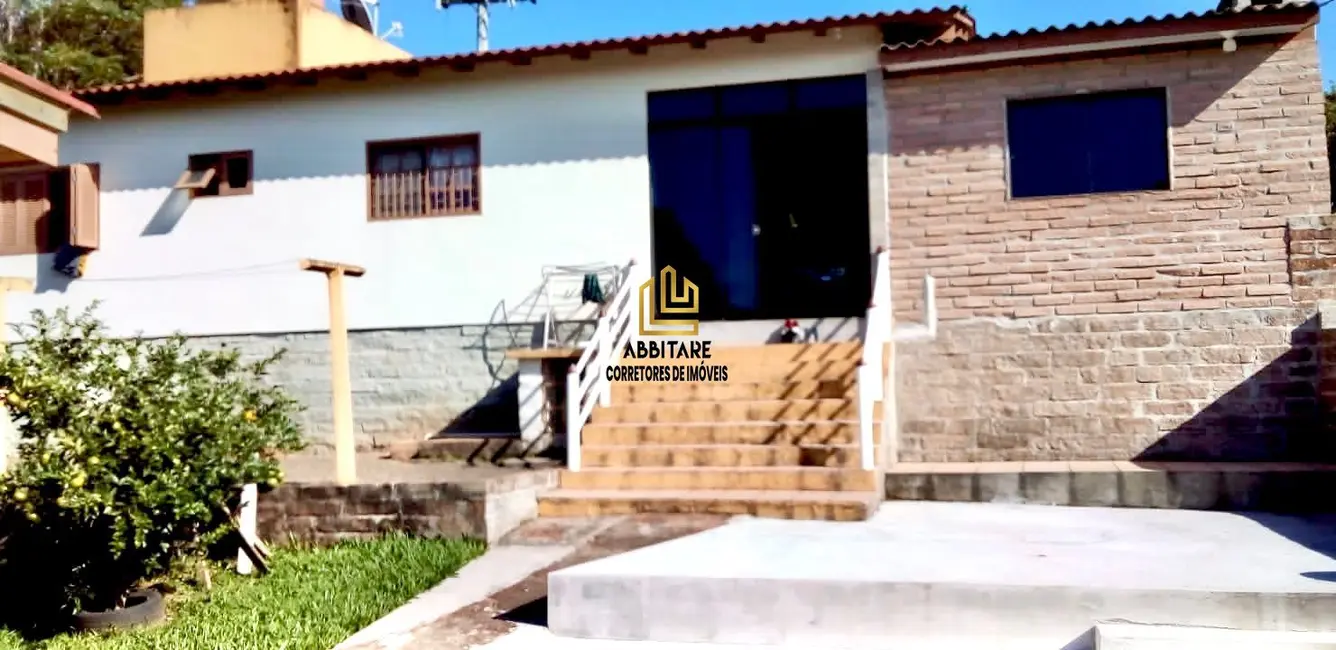 Foto 1 de Casa com 3 quartos à venda, 140m2 em Torres - RS