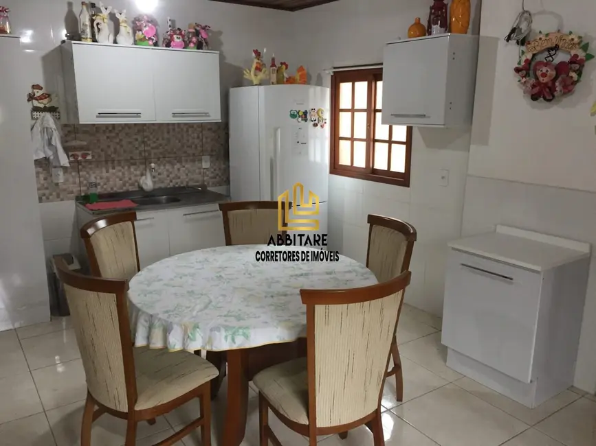 Casa com 5 quartos à venda, 150m2 em Torres - RS - imagem 2 Foto 2 de Casa com 5 quartos à venda, 150m2 em Torres - RS