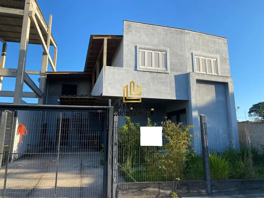 Casa com 5 quartos à venda, 150m2 em Torres - RS - imagem 1 Foto 1 de Casa com 5 quartos à venda, 150m2 em Torres - RS