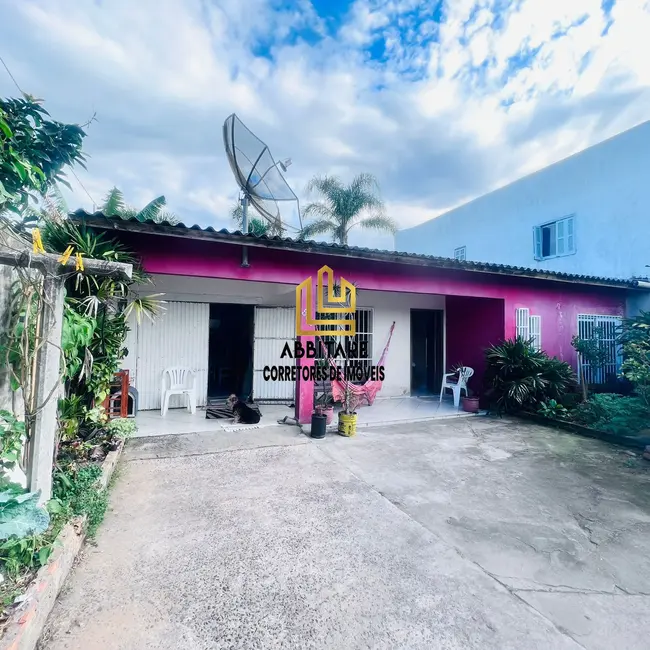 Foto 1 de Casa com 3 quartos à venda, 180m2 em Torres - RS