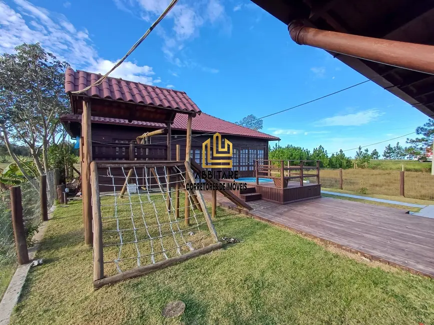 Foto 2 de Casa com 2 quartos à venda, 140m2 em Torres - RS