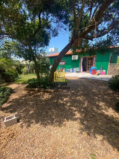 Foto 1 de Casa com 3 quartos à venda, 108m2 em Torres - RS