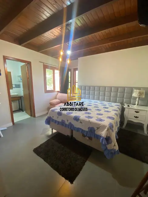 Casa com 3 quartos à venda, 108m2 em Torres - RS - imagem 8 Foto 8 de Casa com 3 quartos à venda, 108m2 em Torres - RS