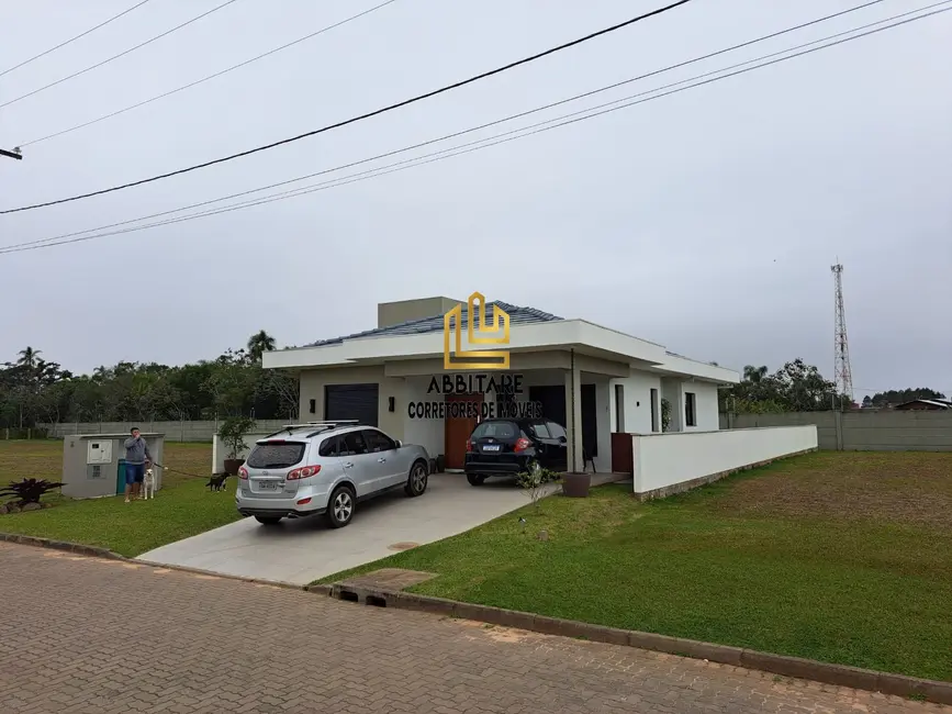 Foto 1 de Casa de Condomínio com 3 quartos à venda, 156m2 em Torres - RS
