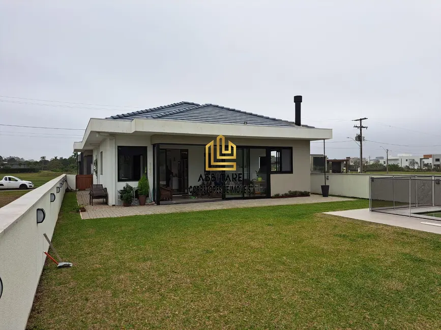 Casa de Condomínio com 3 quartos à venda, 156m2 em Torres - RS - imagem 3 Foto 3 de Casa de Condomínio com 3 quartos à venda, 156m2 em Torres - RS