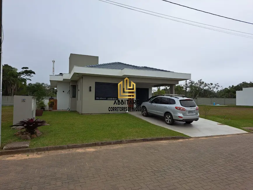 Casa de Condomínio com 3 quartos à venda, 156m2 em Torres - RS - imagem 2 Foto 2 de Casa de Condomínio com 3 quartos à venda, 156m2 em Torres - RS