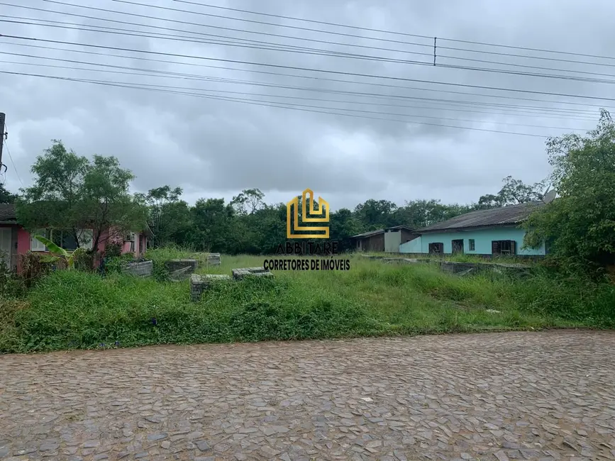 Foto 1 de Terreno / Lote à venda, 390m2 em Torres - RS