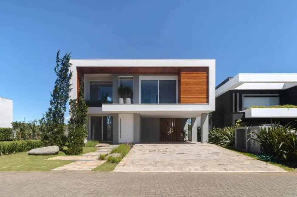 Foto 1 de Casa de Condomínio com 4 quartos à venda, 260m2 em Torres - RS