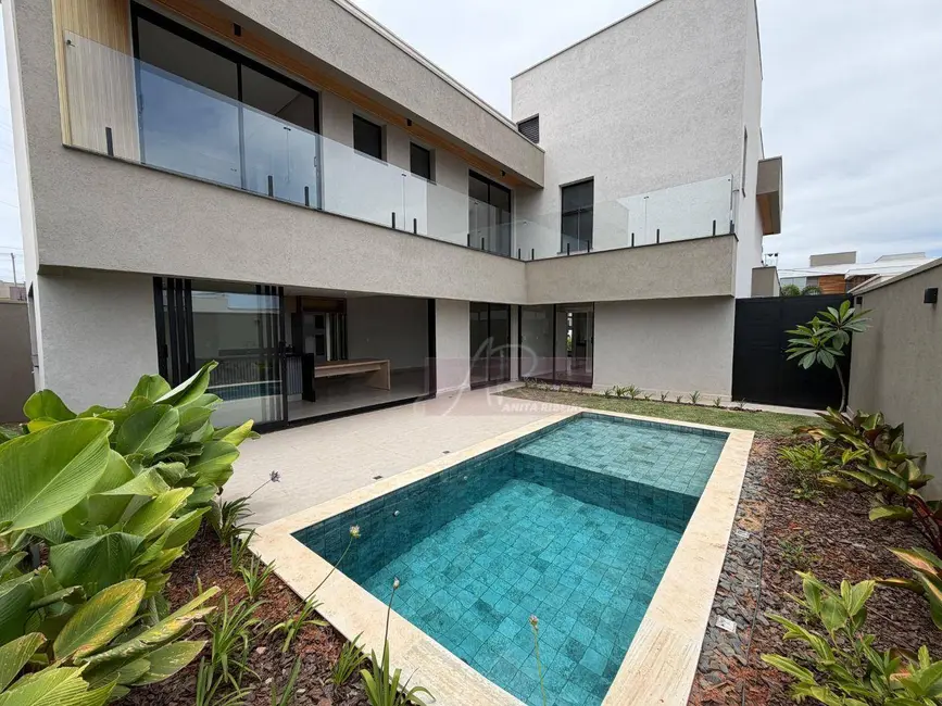 Casa de Condomínio com 4 quartos à venda, 300m2 em Belo Horizonte, Pouso Alegre - MG - imagem 1 Foto 1 de Casa de Condomínio com 4 quartos à venda, 300m2 em Belo Horizonte, Pouso Alegre - MG