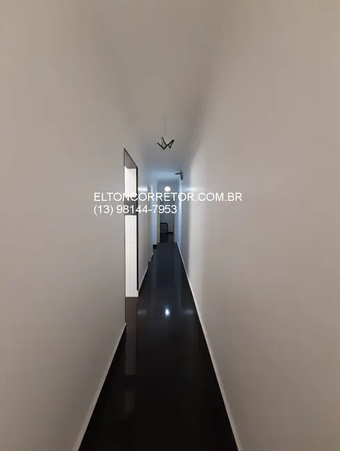 Foto 8 de Casa com 3 quartos à venda, 106m2 em Maracanã, Praia Grande - SP