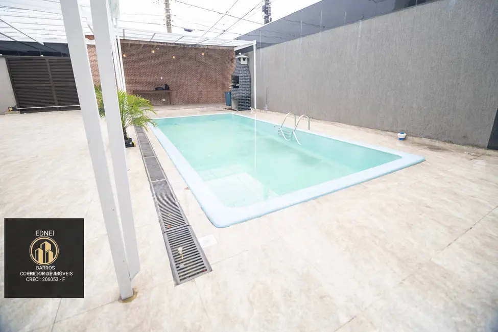 Foto 3 de Sobrado à venda em Tupi, Praia Grande - SP