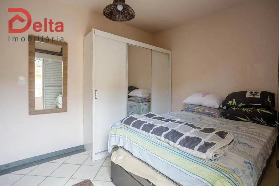 Sobrado com 2 quartos à venda, 57m2 em Bertioga - SP - imagem 9 Foto 9 de Sobrado com 2 quartos à venda, 57m2 em Bertioga - SP
