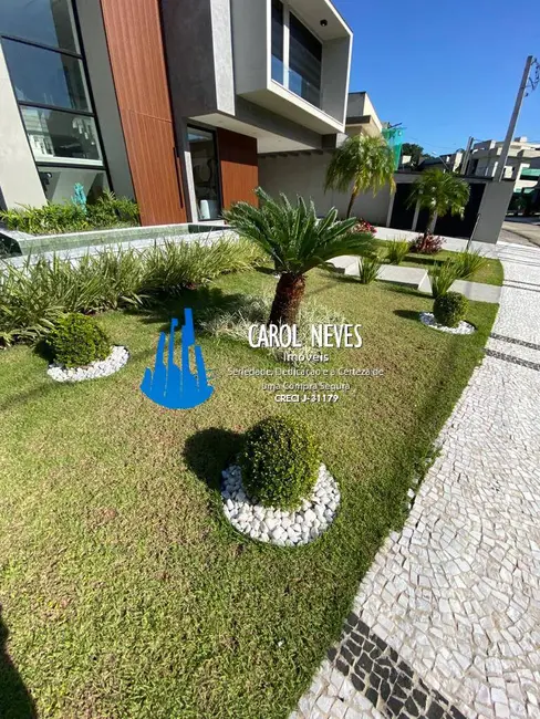 Foto 4 de Casa com 6 quartos à venda, 435m2 em Riviera de São Lourenço, Bertioga - SP