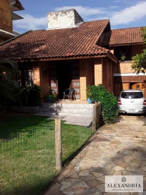 Foto 2 de Casa com 3 quartos à venda, 620m2 em Cacupé, Florianopolis - SC