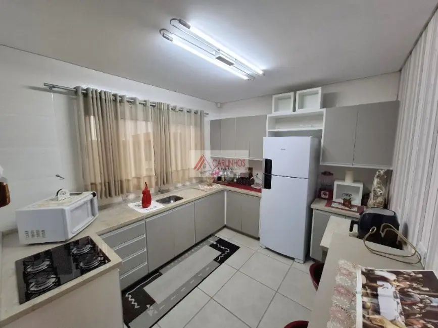 Sobrado com 3 quartos à venda, 130m2 em Centro, Guaratuba - PR - imagem 7 Foto 7 de Sobrado com 3 quartos à venda, 130m2 em Centro, Guaratuba - PR