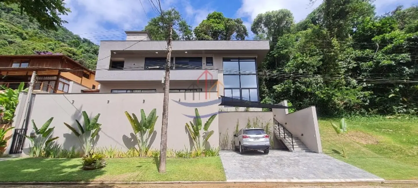 Foto 1 de Casa de Condomínio com 4 quartos à venda, 230m2 em Ubatuba - SP