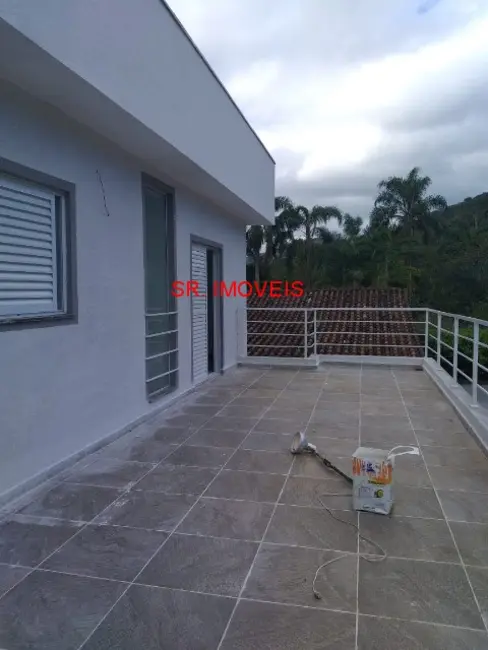 Foto 1 de Casa de Condomínio com 3 quartos à venda, 104m2 em Caraguatatuba - SP