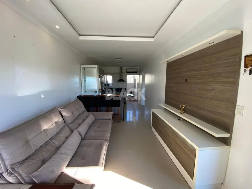 Foto 1 de Casa com 2 quartos à venda, 65m2 em Torres - RS