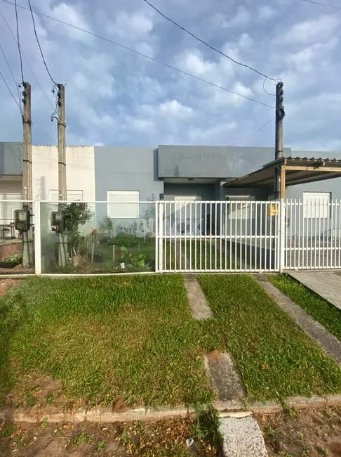 Foto 1 de Casa com 2 quartos à venda, 65m2 em Torres - RS