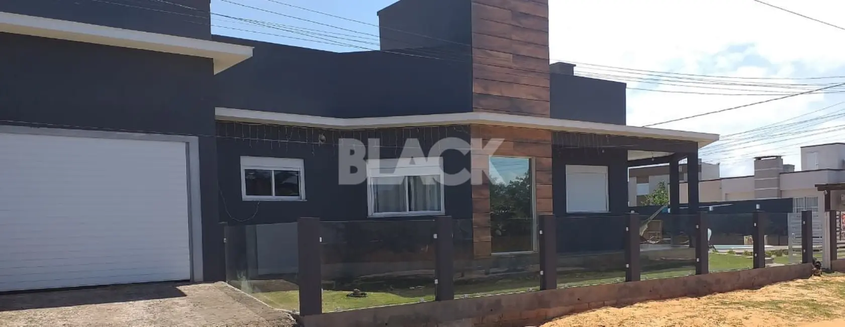 Foto 1 de Casa com 3 quartos à venda, 169m2 em Torres - RS