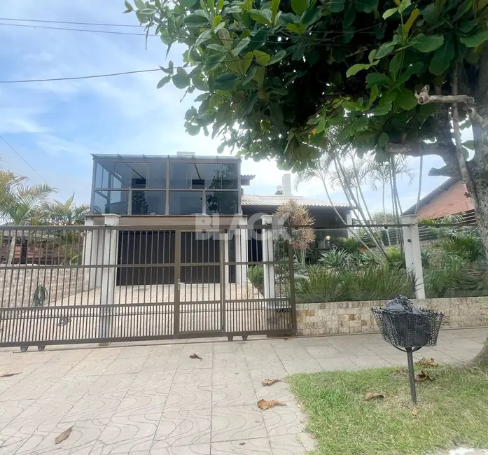Casa com 6 quartos à venda, 358m2 em Torres - RS - imagem 1 Foto 1 de Casa com 6 quartos à venda, 358m2 em Torres - RS