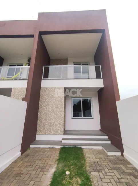 Foto 1 de Casa com 2 quartos à venda, 83m2 em Torres - RS