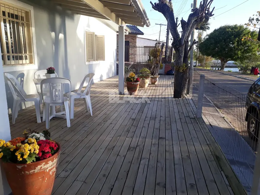 Foto 1 de Casa com 3 quartos à venda, 141m2 em Centro, Torres - RS