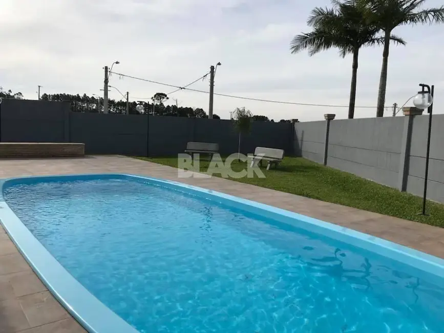 Foto 2 de Sobrado com 3 quartos à venda, 78m2 em Torres - RS