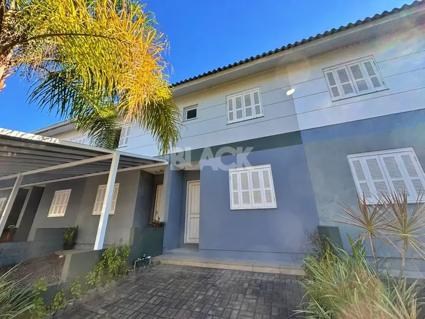 Casa com 3 quartos à venda, 78m2 em Torres - RS - imagem 1 Foto 1 de Casa com 3 quartos à venda, 78m2 em Torres - RS