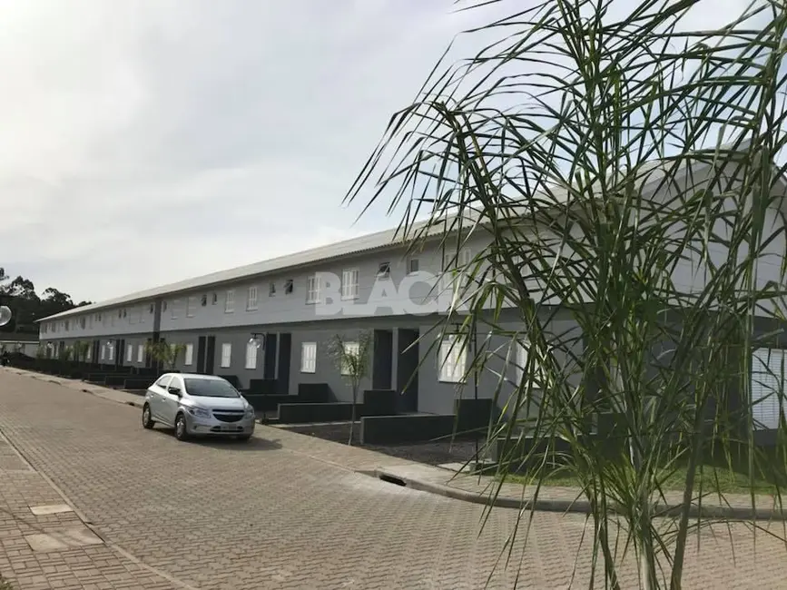 Foto 1 de Sobrado com 3 quartos à venda, 78m2 em Torres - RS