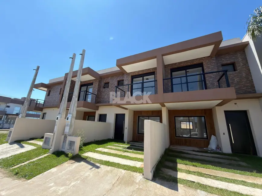 Foto 2 de Casa com 2 quartos à venda, 84m2 em Torres - RS