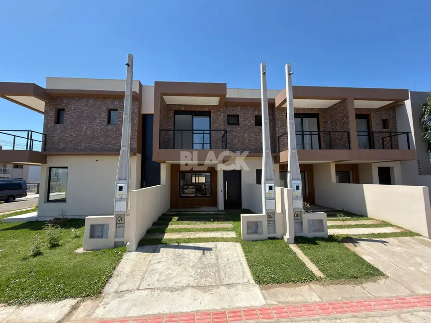 Foto 1 de Casa com 2 quartos à venda, 84m2 em Torres - RS