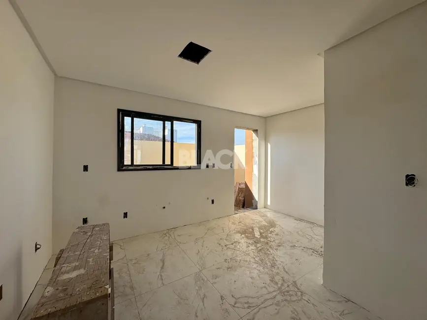 Casa com 2 quartos à venda, 84m2 em Torres - RS - imagem 3 Foto 3 de Casa com 2 quartos à venda, 84m2 em Torres - RS