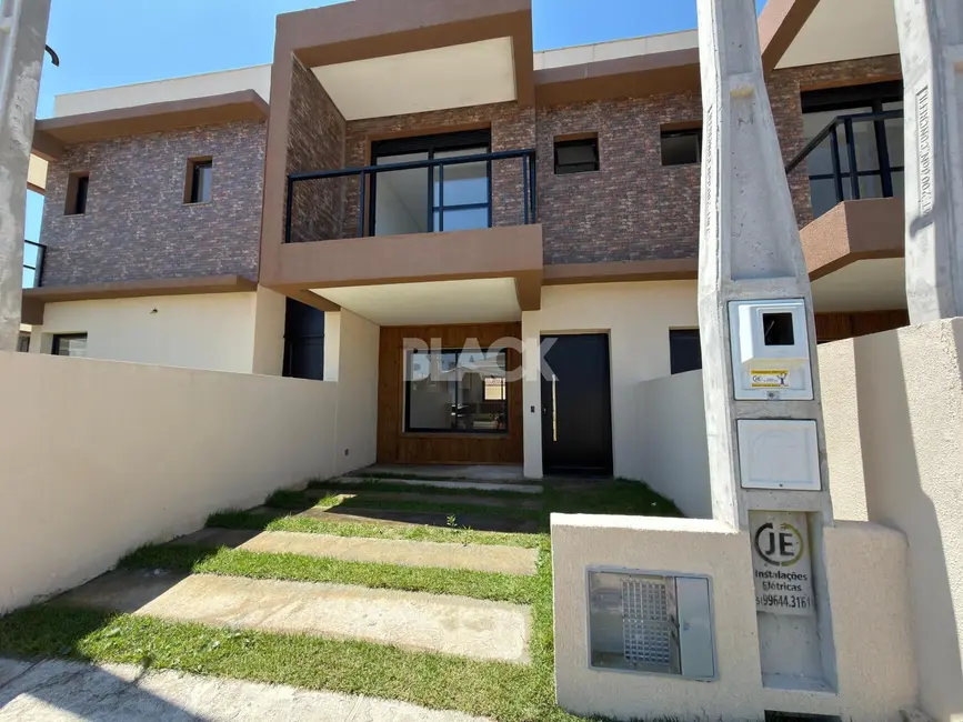 Foto 3 de Casa com 2 quartos à venda, 84m2 em Torres - RS