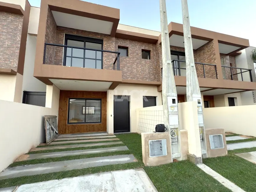 Foto 2 de Casa com 2 quartos à venda, 84m2 em Torres - RS