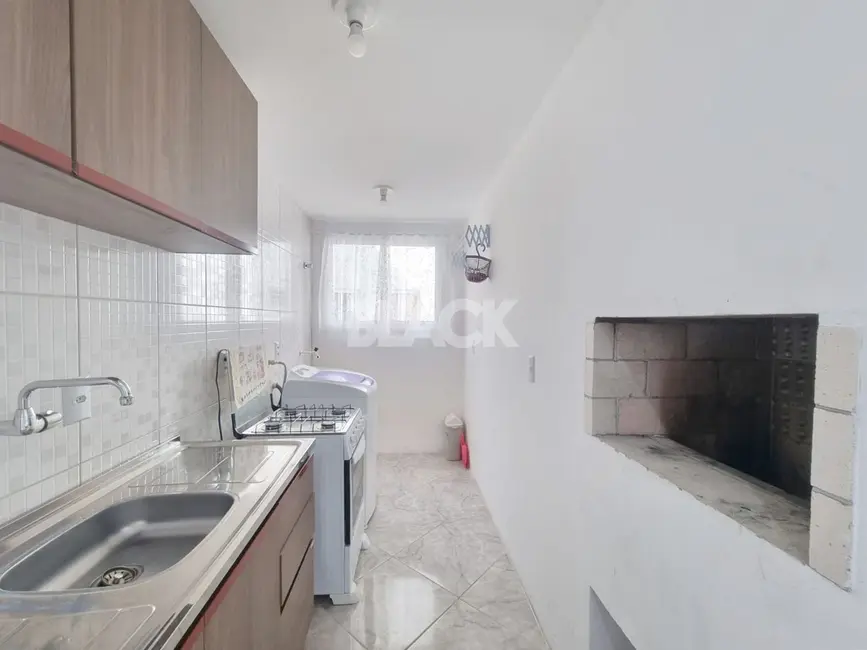 Apartamento com 2 quartos à venda, 50m2 em Torres - RS - imagem 8 Foto 8 de Apartamento com 2 quartos à venda, 50m2 em Torres - RS
