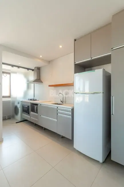 Foto 6 de Apartamento com 2 quartos à venda, 65m2 em Centro, Torres - RS