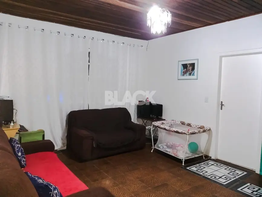 Foto 2 de Casa com 5 quartos à venda, 170m2 em Torres - RS