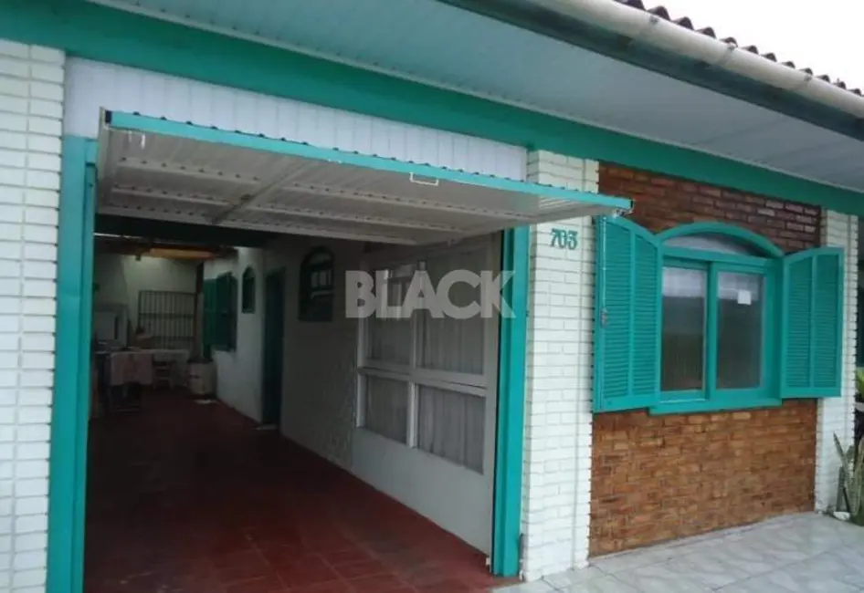 Foto 1 de Casa com 5 quartos à venda, 170m2 em Torres - RS