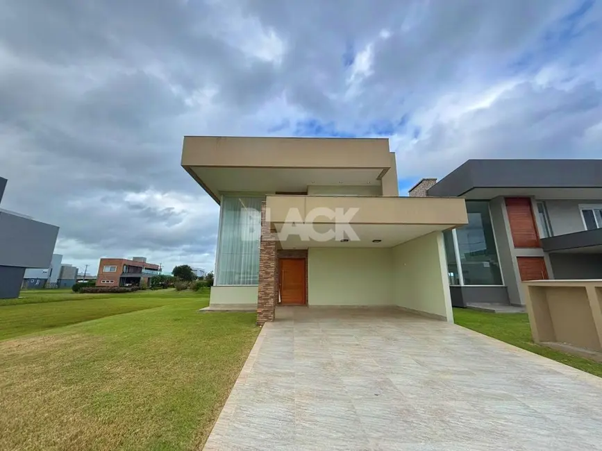 Foto 2 de Casa de Condomínio com 4 quartos à venda, 310m2 em Torres - RS