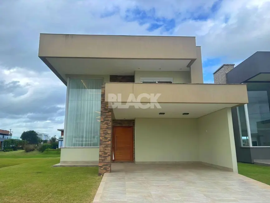 Foto 3 de Casa de Condomínio com 4 quartos à venda, 310m2 em Torres - RS