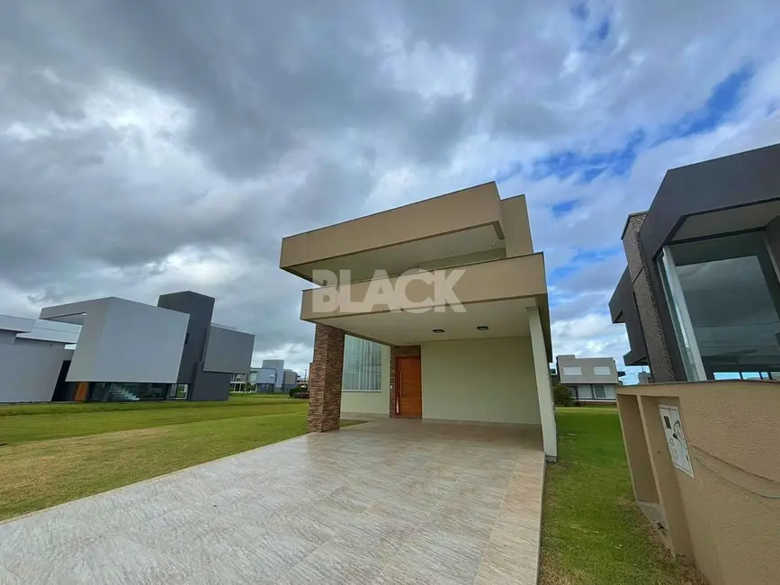 Foto 4 de Casa de Condomínio com 4 quartos à venda, 310m2 em Torres - RS