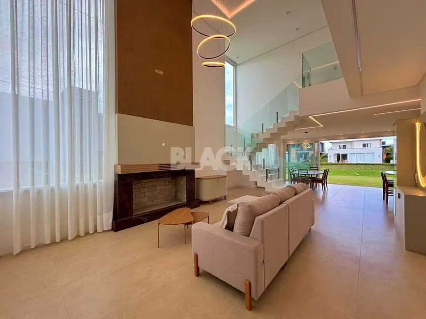 Foto 6 de Casa de Condomínio com 4 quartos à venda, 310m2 em Torres - RS